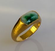 A Chinese jade-set gold ring, size L, stamped .999, 6.7g