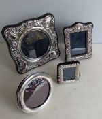 Four silver easel-backed photo frames, largest 17 x 17 cm, smallest 8.5 x 7 cm, all hallmarked (4)