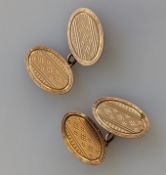 A pair of Art Deco rose gold cufflinks with engine-turned design, hallmarked 9ct, 8.7g