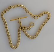 An Edwardian gold flat curb-link Albert watch chain with lobster clasp and T-bar, each link hallmark