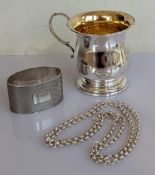 A George V silver christening mug with gilt interior on a stepped based, 7 cm H, hallmarked for Perc