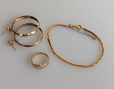 A pair of yellow gold hoop earrings, fancy-link bracelet and a two-tone ring, all hallmarked 9ct, 11