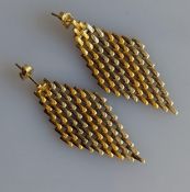 A pair of Italian yellow and white gold drop earrings, each 50mm