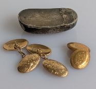 A pair of George V yellow gold oval cufflinks with etched decoration, hallmarked for Henry Griffith