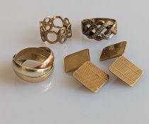 A tri-gold Russian wedding ring, a pair of engine-turned square cufflinks and two yellow gold pierce