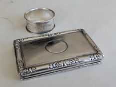 A silver napkin ring, a silver oblong box top, two sugar tongs, two coffee spoons, all hallmarked