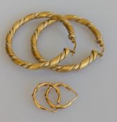 An Italian pair of yellow gold hoop earrings with rope-twist and textured design, and another smalle