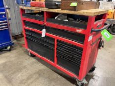 MILWAUKEE PORTABLE TOOL BOX 22 X 41 X 52IN, WITH POWER SUPPLY AND VICE AND ASSORTED CONTENTS OF FAST