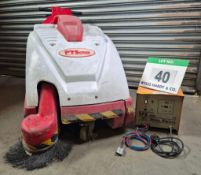 A EUREKA Kobra Battery Electric Pedestrian Floor Sweeper complete with NUOVA Elettra Charger Unit