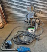 A GRACO FRP Proportioner Gel Coat Mixing and Spraying Unit on a Castor mounted Platform