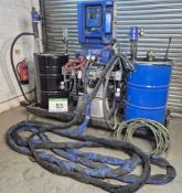 A GRACO Reactor H-XPZ Plural Component Proportioner Twin Barrel Resin Mixing Machine on A Heavy Stee