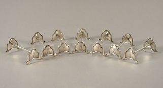 sieben Messerbänkchen, Silber 800/ooo, deutsch, A.20.Jh.