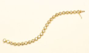Tennisarmband, 750/ooo Gelbgold, 25 Brillanten je ca. 0,30 ct. 