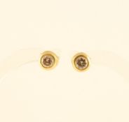 Paar Brillantohrstecker, 750/ooo Gelbgold, je ca. 0,30 ct., 