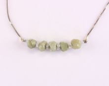Diamantkette, 585/ooo Weißgold, besetzt mit Rohdiamanten, 4,8g