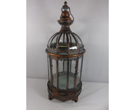 Metal and glass hurricane lamp
