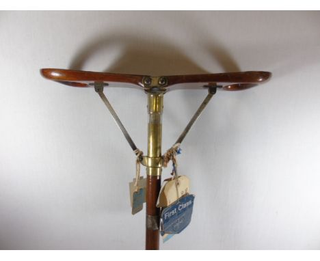Quality antique mahogany shooting stick with brass mounts by Woodward & Sons