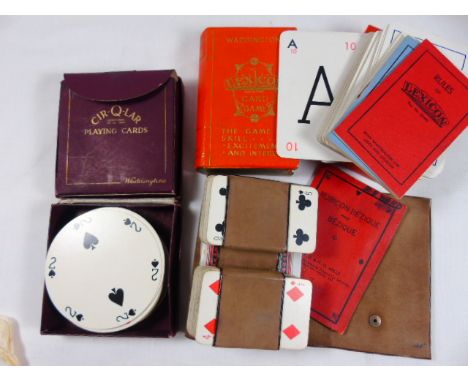 3 Packs of vintage playing cards, vintage game and Robinson Crusoe book dated 1910