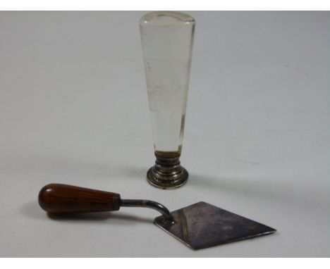 HM Silver seal and a miniature masons trowel