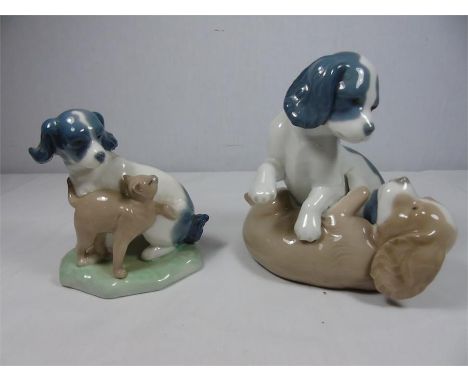 2 Nao figures a dog and cat and 2 dogs playing