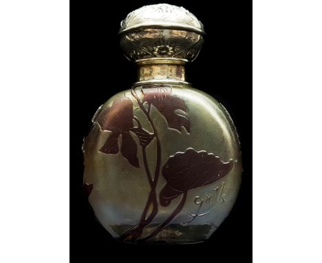 Emile Galle - A silver topped cameo glass scent bottle, the blue opal glass body overlaid in amethyst and cut through with or