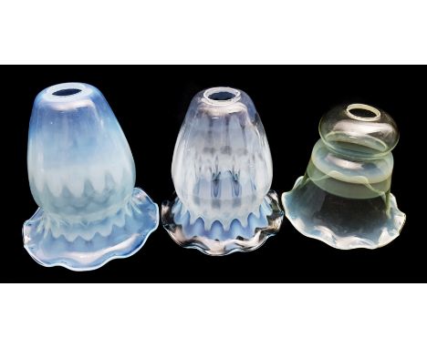 Powell, Whitefriars - Three glass lamp shades, one of straw opal of bell form with wavy rim; and two blue opal of bud form wi