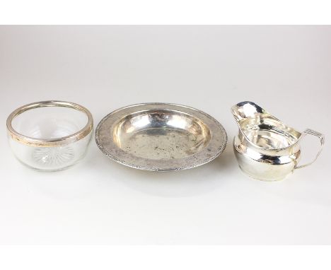 An Edward VIII silver milk jug, a George V silver mounted cut glass bowl and a George V silver plate engraved PRG-S 12-6-38, 