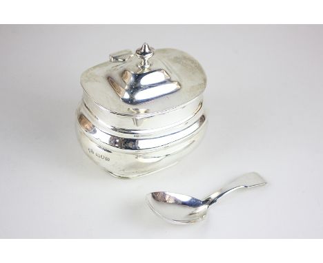 An Edward VII silver tea caddy  by William Hutton & Sons Ltd, London 1909, together with a George III silver caddy spoon, Lon