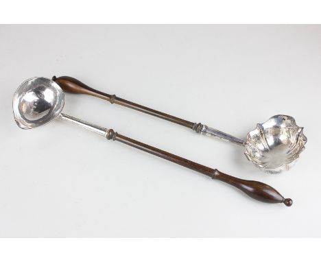 A George II silver toddy ladle on turned handle, maker Richard Gurney & Thomas Cook, London 1742, monogrammed, together with 