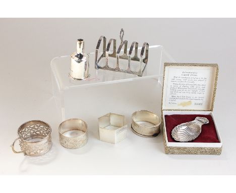 A George VI silver toast rack by Adie Brothers Ltd, Birmingham 1938, an Asprey & Garrard silver party popper case for the mil