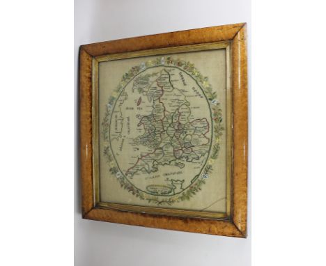 A 19th century sampler of the counties of England and Wales, with floral surround by Caroline Everatt, aged 10, AD 1835, 4.5c