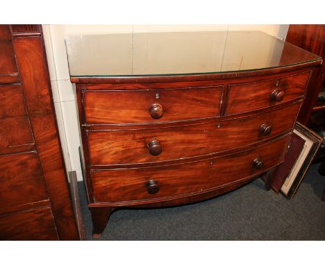 A 19th century mahogany bow front chest of two short over two long drawers, on bracket feet, 104cm