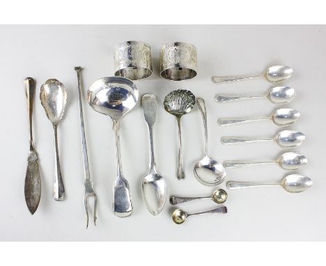 A collection of silver to include a pair of napkin rings, six coffee spoons, a ladle, butter knife, a pickle fork, jam spoon,