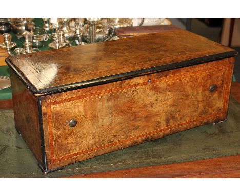 A 19th century Etouffoirs En Acier Swiss music box, the 16 inch cylinder playing twelve airs, the six bells with bird hammers
