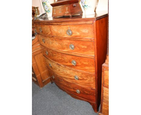 A Victorian mahogany bow front chest of two short over four long drawers, on bracket feet, 105cm