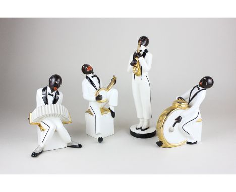 A complete set of four Art Deco porcelain jazz musician figures, Le Jazz by Robj Paris, each playing their respective instrum
