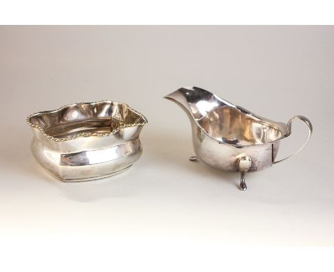 A George VI silver sauce boat by Reid & Sons, Birmingham 1938, together with a sterling silver sugar bowl marked 925 with sca