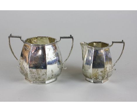 A George V silver octagonal sugar bowl with matching cream jug, by William Hutton & Sons Ltd, Sheffield 1931, 14oz