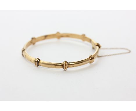 An 18ct gold 'bamboo' style bangle, 21g