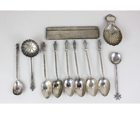 A set of six Edward VII silver apostle teaspoons, two Continental silver small spoons, a sifter spoon, a silver cased comb an