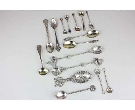 A Dutch silver caddy spoon, two long handled spoons with boat shaped terminals, two Victorian silver apostle coffee spoons, t