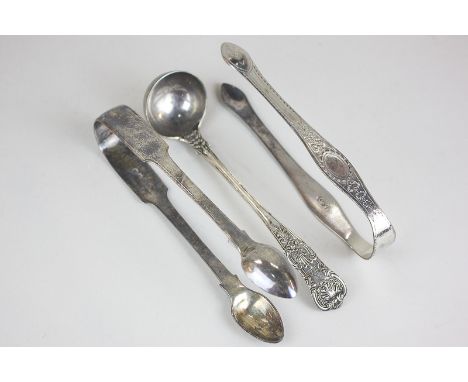 A William IV silver Kings pattern sauce ladle, London 1833, 16cm, a pair of engraved silver sugar tongs and another plain pai