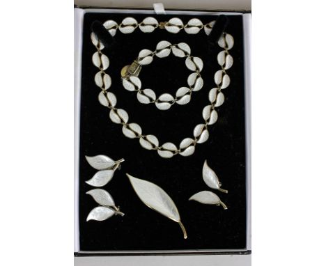David Andersen, a silver and white enamel double leaf pattern necklace, bracelet, brooch and two pairs of ear clips