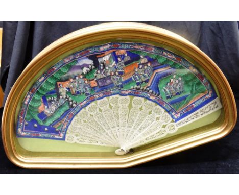 A CHINESE CANTON CARVED IVORY AND PAINTED PAPER FAN  held in gilt framed and glazed case, 53cm wide