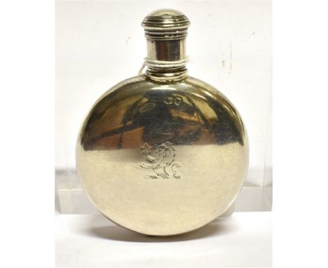 A VICTORIAN SMALL SILVER SPIRIT FLASK the small moon shaped flask with silver screw off lid, with lion crest, hallmarked Lond