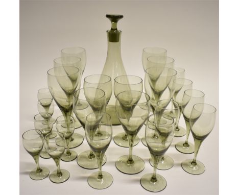A 1960S DECANTER AND SUITE OF GLASSES  the decanter and stopper 29cm high, together with six glasses 18.5cm high, four glasse