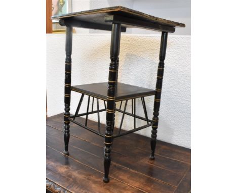 A VICTORIAN AESTHETIC MOVEMENT EBONISED OCCASIONAL TABLE  with gilt highlights, in the manner of E W Godwin, the square secti