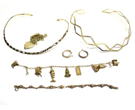 SOME ITEMS OF SILVER JEWELLERY  comprising two torque style necklaces, a fine link charm bracelet with seven charms, a bracel