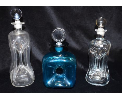 A HOLMEGAARD GLASS 'GLUG GLUG' DECANTER AND STOPPER  and two others