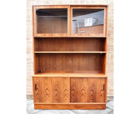 POUL HUNDEVAD &amp; CO: A DANISH DISPLAY CABINET  the upper part with sliding doors enclosing illuminated display section wit